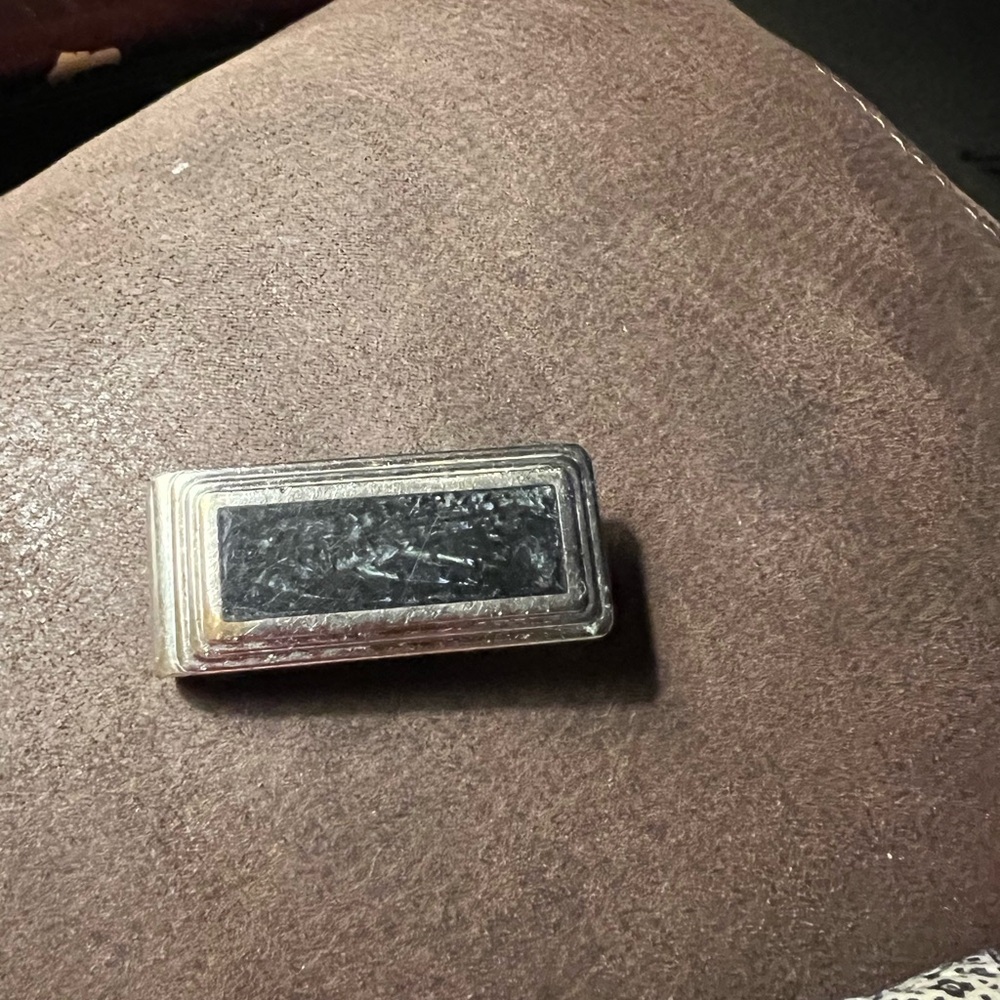 Adjustable money clip.